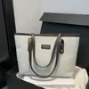 Bolso de mano de moda transfronterizo, nuevo bolso de hombro simple vintage para el día a día, bolso casual personalizado para viajes cortos para mujer