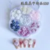 Caja de Flor de Ciruelo con Lazos de Perla, Flores de Dibujos Animados, Pedrería Mixta para Uñas, Decoraciones Brillantes para Uñas, Decoraciones Mixtas al por Mayor