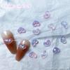Paquete de accesorios para uñas con diseño de estrellas de mar, fantasía de celebridades en línea populares, coloridos y luminosos, accesorios para uñas con forma de estrella de amor, mixtos