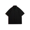 Marca de moda de alta calle americana Camisa de color liso de manga corta Primavera Top cómodo Juventud Simple Holgada Chaqueta casual Hombre