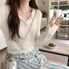 Falda Elegante Estilo Francés con Cárdigan de Punto Fino de un Solo Botón para Mujer Primavera y Verano Nuevo Top Corto Coreano Protector Solar