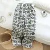 Pantalones de pijama de otoño e invierno para pareja, estilo unisex, forrados de felpa y engrosados, pantalones largos de cuadros, corte holgado, adecuados para uso casual y como ropa de estar en casa.