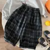 Pantalones para niño Bangcheng 2026 invierno nuevo estilo a cuadros para niños forrados de polar pantalones casuales holgados largos para niños pequeños y mayores dropshipping