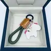 Fique Rico Imediatamente Pingente de Chaveiro de Couro de Vaca Feito à Mão para Carro Lanyard Elegante Simples Exquisito para Casais Masculinos e Femininos