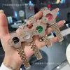 Soporte de Envío Directo Trébol de Cuatro Hojas Completo de Diamantes Nicho Lujo Ligero Tendencia de Moda Correa de Acero Reloj de Cuarzo para Mujer Reloj Deichka