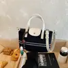 Bolso Exquisito de Gran Capacidad Transfronterizo para Mujer 2026 Nuevo Verano Bolso de Hombro y Axila de Gran Capacidad Bolso Cruzado Tipo Cubo para Viajes
