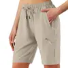 Bestseller Transfronteiriço Primavera/Verão 2026 Shorts Casuais Leves Femininos com Bolso e Zíper para Esportes ao Ar Livre com Cintura Elástica Cinco Pontos