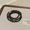 Pulsera de Tres Círculos con Cuenta Dzi de Sándalo Negro Modelo Nuevo 2026 para Mujer, Joyería Retro de Nicho de Alto Nivel Estilo Chino Nuevo para Pareja