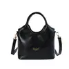 Venta al por mayor transfronteriza de bolsos tipo cubo nuevos, bolsos de mano versátiles para mujer, bolsos tote, bolsos cruzados y bolsos de mano elegantes con estética japonesa y coreana