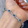 Pulsera nueva de invierno 2023 de plata S925 chapada en platino con topacio azul Londres incrustado JB7228-11 4*5