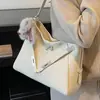 Bolso Versátil de Nicho para Mujer 2025 Nuevo Modelo Textura de Alta Calidad Bolso de Hombro Cruzado Súper Popular Bolso Tote de Gran Capacidad para el Trabajo