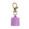 Estuche protector redondo de silicona para labiales, estuche de llavero portátil para labiales, colgante de almacenamiento anticaídas, disponible para venta al por mayor