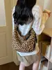Bolso de moda con estampado de leopardo para mujer 2026 nuevo versátil bolsa de albóndiga moda de moda bolso de hombro bandolera bolso para el antebrazo de viajero