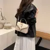 Bolsa de Mão Retro de Luxo Feminina 2025 Nova Moda Versátil Ombro Transversal Carteiro Pequena Quadrada Tendência