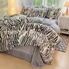 Juego de ropa de cama de cuatro piezas estampado de terciopelo de leche de alta densidad, terciopelo de leche engrosado de doble cara, ropa de cama de otoño/invierno, grandes cantidades en stock