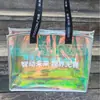 Bolsa Transparente de PVC Bolsa a Laser Bolsa de Gelatina Colorida Logotipo Personalizado Bolsa de Presente de Plástico Bolsa de Embalagem Personalizada
