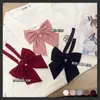 Pajarita de lazo oblicuo de raíz blusa de estudiante [cerdo castaño JK] color liso pluma Joker japonés cuello pequeño flor básico