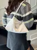 Bolso de Mano de Alta Gama Estilo Francés de Nicho 2025 Bolso Tejido Versátil de Moda Bolso Bandolera Bolso Baguette