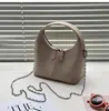 Bolso de Mujer de Alta Gama Retro con Textura de Lujo Ligero de Moda, Nuevo Diseño de Nicho Transfronterizo, Bolso de Mano Suave de PU para Salir