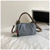 Bolso de Mano de Moda para el Hogar Shuai Mi para Mujer 2026 Verano Nuevo Estilo Coreano de Moda Bolso Cuadrado Pequeño Bolso Cruzado Simple de Nicho