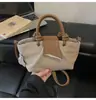 Bolso de mano con estampado de lichi de moda transfronterizo para mujer, nuevo y elegante bolso cubo vintage, bolso de hombro y bandolera de moda