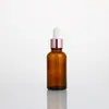 Botella de Aceite Esencial de 30ml Botella Pequeña Vacía Empaque Vidrio Color Té Sentido Avanzado Botella con Gotero de Presión Esencia Embotellada