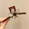 Pinza para el pelo de alta gama estilo coreano, pinza para el pelo de color block de dibujos animados para la parte trasera de la cabeza, pinza de tiburón grande versátil 2026 nueva para mujer