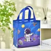 Bolsa de regalo al por mayor bolsa de tela no tejida de dibujos animados bolsa de embalaje de astronauta bolsa de regalo de dulces para fiesta bolsa de compras