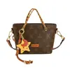 Bolso de Mujer de Alta Gama 2026 Nuevo Bolso de Mano con Estampado Retro Bolso Cubo de Moda Versátil Bolso Cruzado de Hombro Único