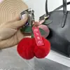 Piel de conejo Rex real Colgante para llavero de coche Cherry Peluche Adornos lindos para bolso Adornos de piel nuevos de celebridad de Internet