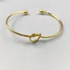Pulseira Europeia e Americana de Metal com Nó de Amor para Mulheres Pulseira DIY Abertura Dourada Joia de Mão Pulseira Tribal Kink de Noiva