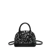 Elegante y estilizado bolso de mano, colección otoño 2026, diseño versátil en forma de concha, moderno bolso cruzado para mujer