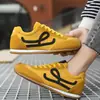 Zapatillas de entrenamiento alemanas 2026 modelo nuevo primavera/verano, cómodas, ligeras, de suela plana, retro, versátiles, zapatillas casuales de suela blanda al por mayor