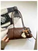Bolso pequeño de axila retro de alto valor transfronterizo para mujer, nuevo y elegante, bolso de mano para ir al trabajo, bolso de un solo hombro, bolso Boston, moderno