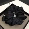 Elástico de cabelo preto moderno tipo "intestino grosso" simples para rabo de cavalo de menina em alta elástico durável bola de cabelo cordão para cabelo adorno de cabeça