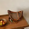 Bolsas tejidas de nicho estilo coreano para mujer, Bolso cubo de moda nuevo y moderno para el verano 2026, Bolso de hombro para el día a día