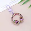 Llavero de Auriculares con Cabeza Tridimensional de Caramelo Sinfonía Acrílica Moda Más Fácil de Combinar Colgante Creativo para Bolsos Colgante para Pareja Mejor Amigo