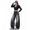 Jeans de pierna ancha en mezclilla lavada color naranja joven para mujer, con diseño de salpicaduras de tinta desgastadas, corte holgado, efecto adelgazante y estilo versátil y elegante de pierna curva