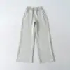 Ropa de Mujer al por Mayor Transfronteriza Estilo Europeo y Americano 2026 Nuevo Color Sólido Patchwork Tejido Cintura Forro Polar Pantalones de Chándal Pierna Ancha Pantalones Casuales