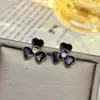 Pendientes de plata con luz de aguja, de lujo, de circonita negra de alta gama, con un toque de amor, pendientes geométricos de temperamento nicho, con un diseño único y sentido del humor.