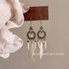 Explotaciones transfronterizas Pendientes de estilo nacional bohemio pendientes de plumas con cuentas de gotas de agua de alto sentido de verano en stock venta al por mayor