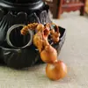 Chaveiro Pingente Esculpido Estéreo de Cabacinha Canalizadora de Dinheiro de Madeira de Pessegueiro Pingente de Bolsa para Chave de Carro de Madeira Artesanato