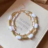 Collar de cuentas geométricas degradado colorido transfronterizo europeo y americano, cadena para la clavícula estilo resort de playa, joyería de lujo ligero de alta gama al por mayor