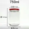 Frasco de vidrio sellado de grado alimenticio con tapa de hierro para conservas frasco de vidrio para conservas resistente a altas temperaturas se puede cocinar al vapor y cocinar gama completa de tamaños botella vacía