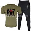 Moda de Comércio Exterior Camiseta Masculina de Manga Curta Calça Terno Casual Gola Redonda Cor Lisa Estampa de Letras Roupa Esportiva Casual