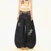 Jeans de ganga retro americano com estampa de leopardo e bordado de estrela, design casual solto de perna larga e curvada para homens e mulheres