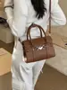 Transfronterizo 2026 Primavera Nuevo Moderno Retro Simple Moda Bolso Pequeño Cuadrado Bolso de Hombro para Mujer Bolso Cruzado para Viajar