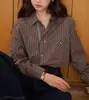 Camisa de manga comprida listrada estilo retrô francês soligther para mulheres, nova coleção outono 2026, caimento solto, tecido escovado