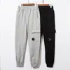 Pantalones de lente europeos y americanos transfronterizos CP multibolsillo de ocio y deportivos funcionales cortavientos para hombre y mujer CP de pierna estrecha venta al por mayor