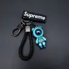 Novo Chaveiro Mecânico de Urso Pingente de Carro Desenho Animado da Moda Decoração Criativa para Bolsa de Casal Chaveiro de Silicone